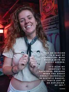 Portrait of an XD community member smiling with clasped hands, with a personal quote
